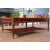 A Large Coffee Table from Niagara Furniture with all of the bells and whistles including four drawers, reeded legs, solid...