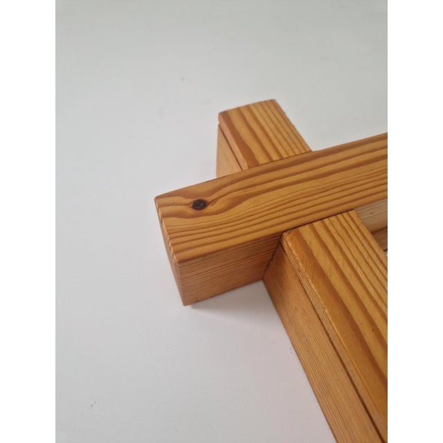 Mirror made of solid pine wood. The mirror with a large glass and frame made of pine wood, frame parts form a cross at the...