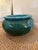 Exceptional oversized Chinese ceramic jardiniere featuring a dramatic low, rounded form finished in a rich turquoise and...