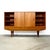 Dimensions: 71” L x 16” - 18” D x 44 1/4” H Origin: Silkeborg, Denmark Designer: Attributed to Børge Dam Manufacturer:...