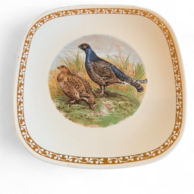 Bring a touch of rustic French elegance to your table with this exquisite set of twelve vintage plates by Longchamp,...