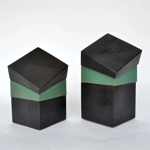 - Sculptural square studio pottery boxes - Signed PS - The geometric design is emphasised by the alternating green and...