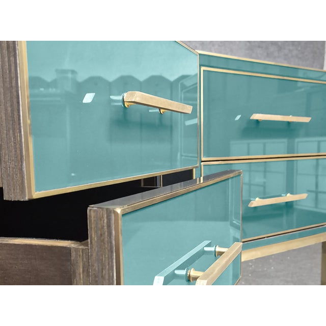 Pair of Azure bedside tables in solid wood and brass edging to bring mid-century modern style and Italian artistry to your...