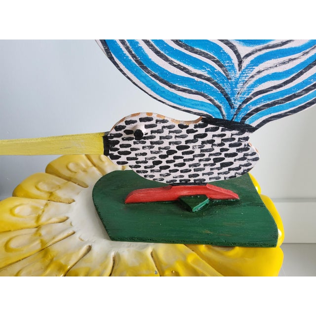Presenting an offbeat bird sculpture made from plywood by the popular folk artist Marvin Finn (1913-2007). It measures a...
