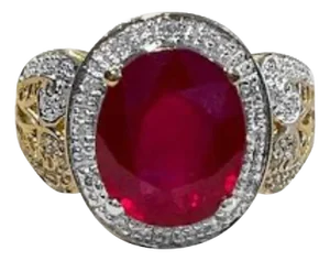 Oval 7.5 Carat Treated Ruby and 1 Carat Diamond 14 Karat Yellow Gold Ring