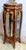 Add timeless European elegance to your space with this charming French-style display cabinet. Crafted in rich brown wood...