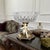 Vintage Hollywood Regency compote candy dish featuring a clear pressed glass bowl set into a decorative figural base. The...