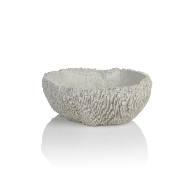A stunning piece of resin replica coral turns into a decorative bowl. Inspired by nature, this coral bowl is a sculptural...