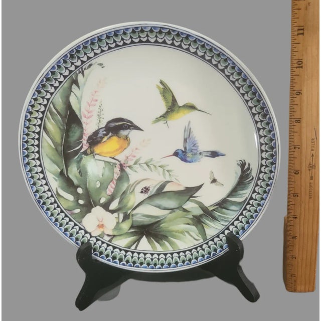 Crafted with the utmost precision, this Vintage Heinen Delfts Blaum Hummingbird Floral Platter exudes timeless elegance....