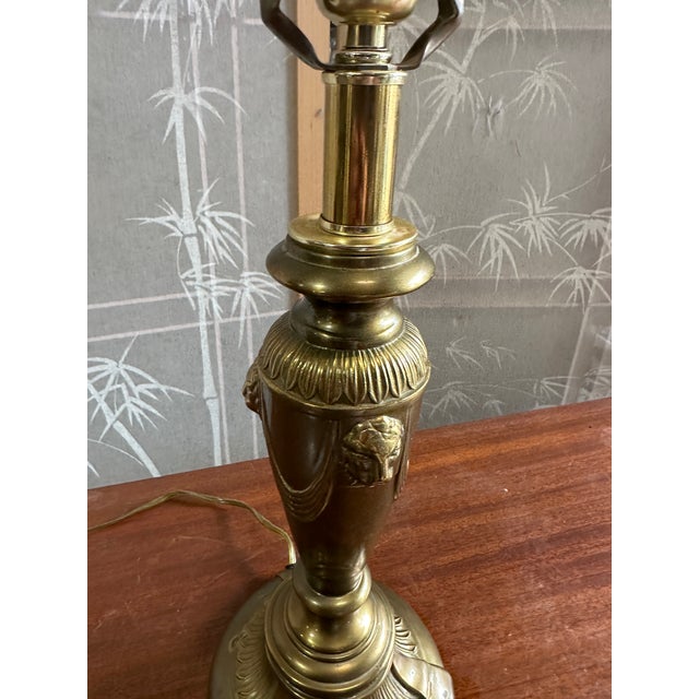 Up for consideration is a beautiful vintage brass skinny table lamp with lion head details. This is such a lovely piece...