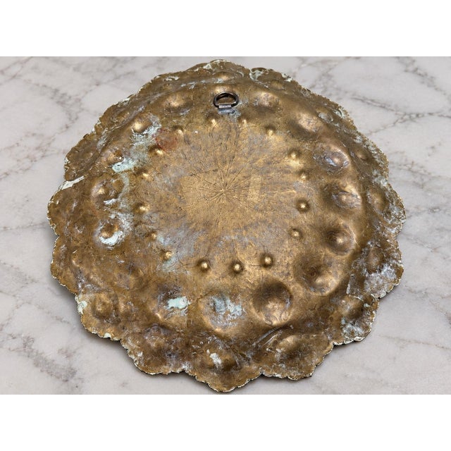 Beautiful vintage Indo-Persian style brass decorative wall plate featuring intricate repoussé and hand-chased detailing....