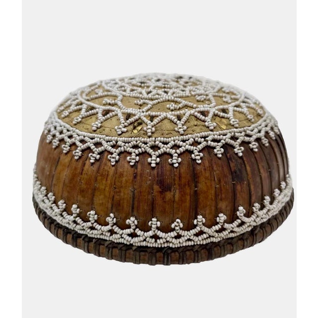 This very intricate 1920’s Balinese temple offering cover is used to cover elaborate food offerings carried on their head...