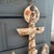 An eye-catching, artisanal coastal folk art wall hanging crafted in the form of a classic ship's anchor. This unique,...