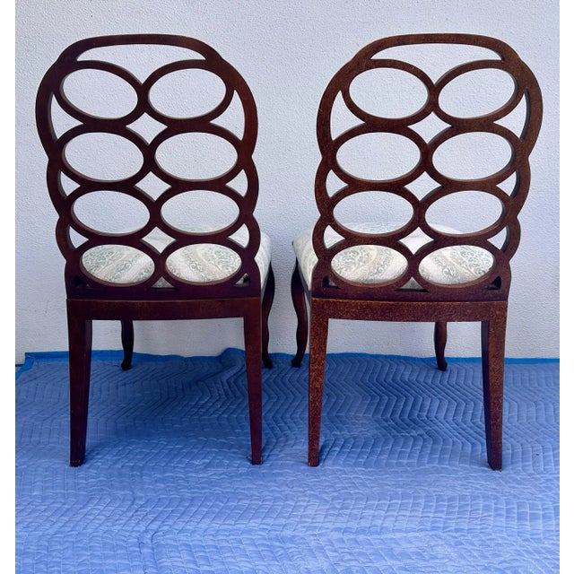 Set of 8 Frances Elkins Style Loop dining chairs in a medium wood tone by the luxury furniture makers Lane Venture. These...