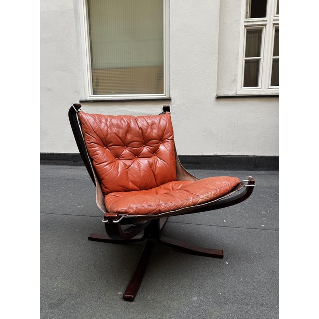 An iconic piece of Scandinavian mid-century design, this Falcon low back lounge chair was created by Sigurd Ressel for...