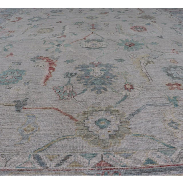 Modern Large Modern Oushak With Floral Design on Light Blue Border With Pop of Colors For Sale - Image 3 of 13
