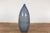 A tall Prem Collection ceramic artisan hand crafted vase with rounded lines. Experience the beauty of authentic, handmade...