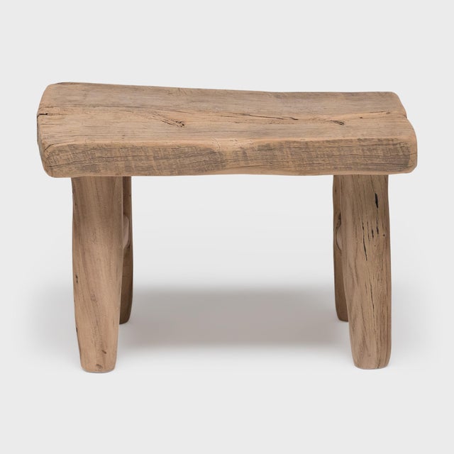 Crafted of wood reclaimed from 18th-century Chinese buildings, this small stool embraces the notion of “wabi-sabi" with...