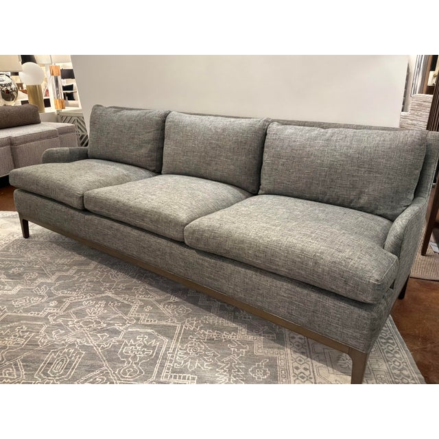 Stylish Studio a Home Laguna Sofa. Gray textured fabric, 3 seats, wood frame. Original Retail $5097. Showroom floor sample.