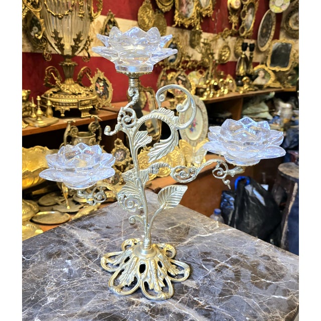 This luxury brass and crystal pedestal serving stand is designed to elevate elegant gatherings and refined table...