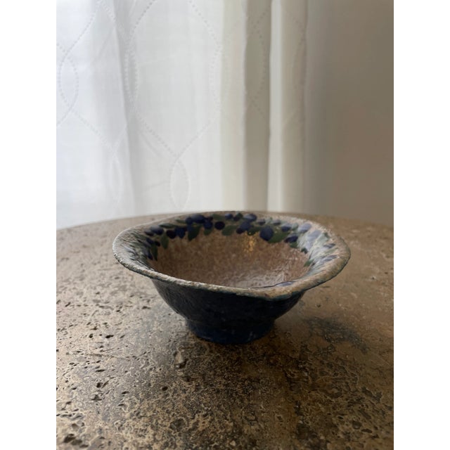 A charming and early bowl designed by Josef Ekberg for Gustavsberg. Wonderful color and glaze with a floral motif. Signed...