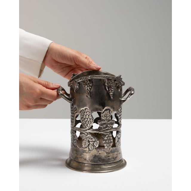 This mid 20th century Art Nouveau decorative object from France is finished in silver. Its design carries the Art Nouveau...