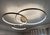 Plumbeo triple ring suspension light in galvanic plumbeo by aggiolight. Dimensions: small ring: d 80 x h 3.5 cm. Medium...