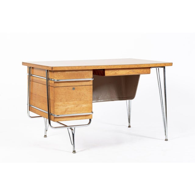 This vintage mid century modern Trimline desk was designed by Kem Weber for Heywood Wakefield circa 1950. With clean lines...