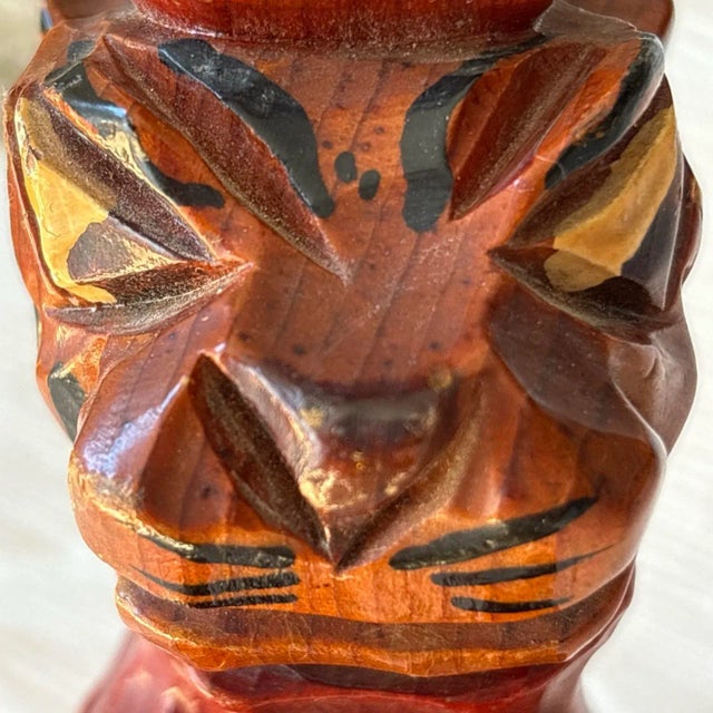 The Carter Hoffman Princeton University Tiger Mascot Wood Figurine is a small, handmade collectible from the 1950s. This...