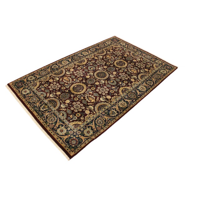 Designed with mesmerizing intricacy and gorgeous color palette, this hand-knotted masterpiece demonstrates the beauty and...