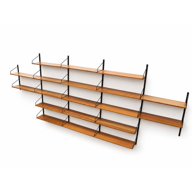 Large vintage wall system with shelves from the 1960s Bring character and functionality together with this impressive...