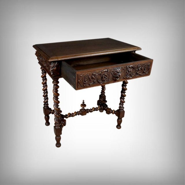 This elegant small walnut writing desk, crafted in the late 19th century in the pure Henri II style, is distinguished by...