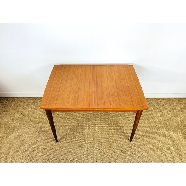 Elegant and timeless, this extendable dining table, inspired by 1960s scandinavian design, captivates with its clean lines...
