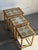 Turned legs support a decorative ceramic tile surface in a versatile set of 3 space-saving accent tables engineered to...