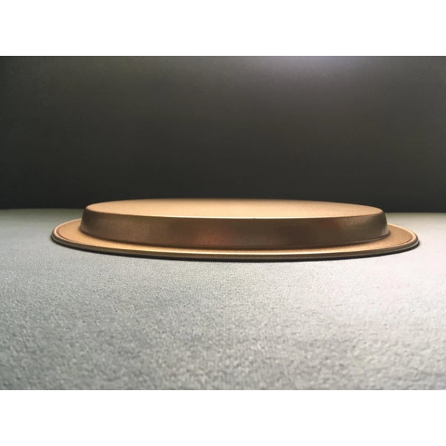 A vintage eagle and shield serving tray in excellent condition.