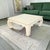 A Ming-style square coffee table by Lane Furniture, produced circa 1990 and executed in a cream crackle lacquer finish....