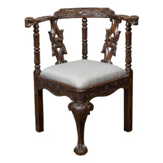 English 19th Century Oak Corner Chair with Carved Foliage and New Upholstery For Sale