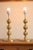 Two exquisite polished brass table lamps featuring a delightful round bobbin-style design. These lamps have undergone...