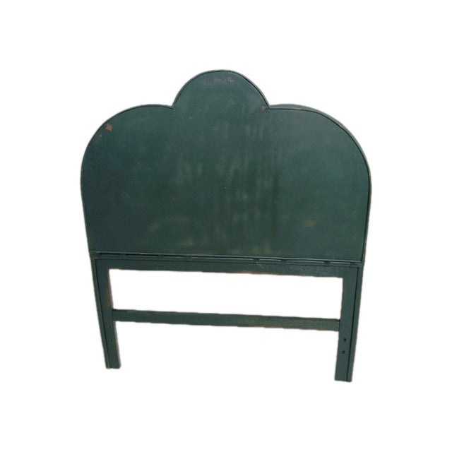 The product is a vintage bamboo twin headboard in a new dark green color. This unique headboard adds a touch of elegance...