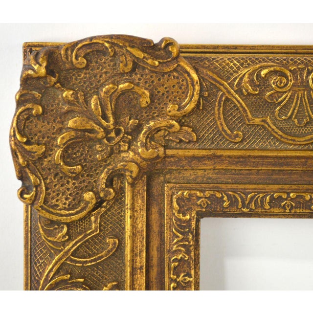 A very appealing Louis XIV style gilt painting frame. Frame displays a rich golden bronze finish and exhibits a fine and...