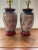 A lovely pair of Chinese Porcelain Ceramic Lamps. The vintage lamps are decorated with a traditional floral pattern, a...
