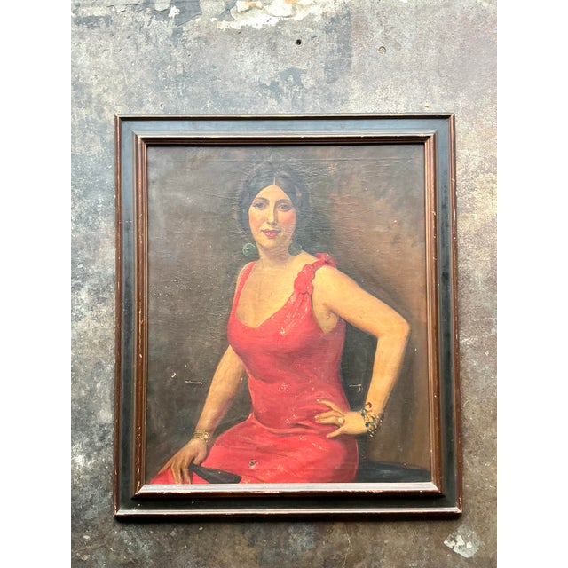 Command attention in any room with this dramatic vintage oil portrait, a stunning homage to Art Deco glamour and the...