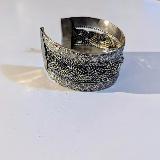 Seller delegated shipping, arrives 4-8 days from purchase. 80's Egyptian made braided cuff bracelet. Although not marked,...