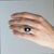 An exceptional Art Deco cocktail ring from circa 1920 — monumental in scale, extraordinary in conception. A piece of...