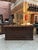 This antique oak sideboard has been fully restored. It features three doors decorated with a diamond pattern and original...