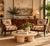 Stunning pair of Palecek coastal organic lounge armchairs featuring beautifully sculpted dark-stained rattan frames,...