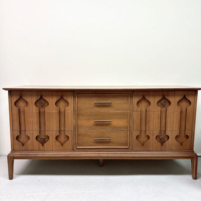 Features 9 drawers. Wood composition may be walnut. Appears to be Kent Coffey Perspecta. Item is unmarked