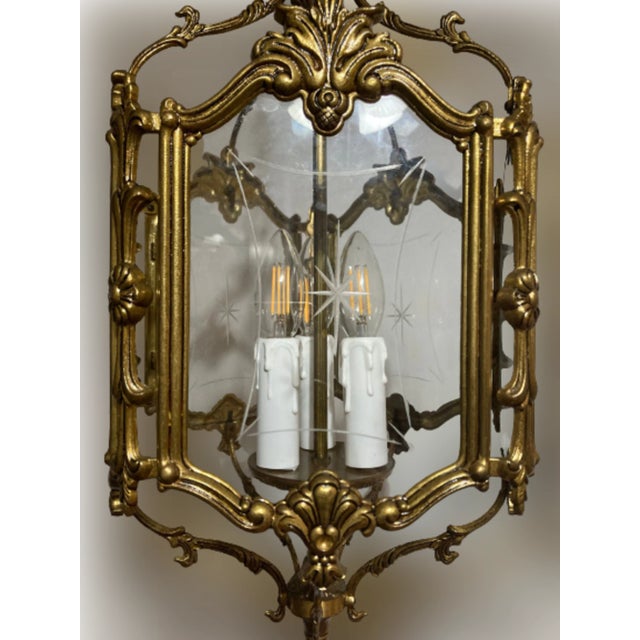 Five Farol of hand -carved glass. French Bronze style molten with original patina of the 50s. One of the crystals has a...