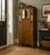 A compact Edwardian Arts & Crafts oak hall wardrobe, beautifully crafted in quarter-sawn oak with a mirrored door, pierced...