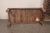 A British Colonial daybed (or coffee table) from the early 20th century. This antique British Colonial daybed from Kerala,...